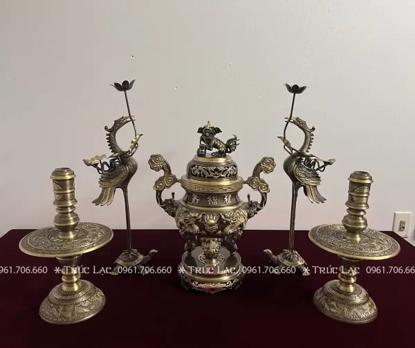 a group of bronze objects on a table